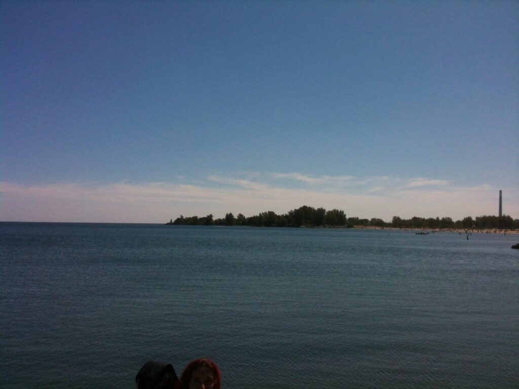 Nearby curving shoreline of Lake Ontario